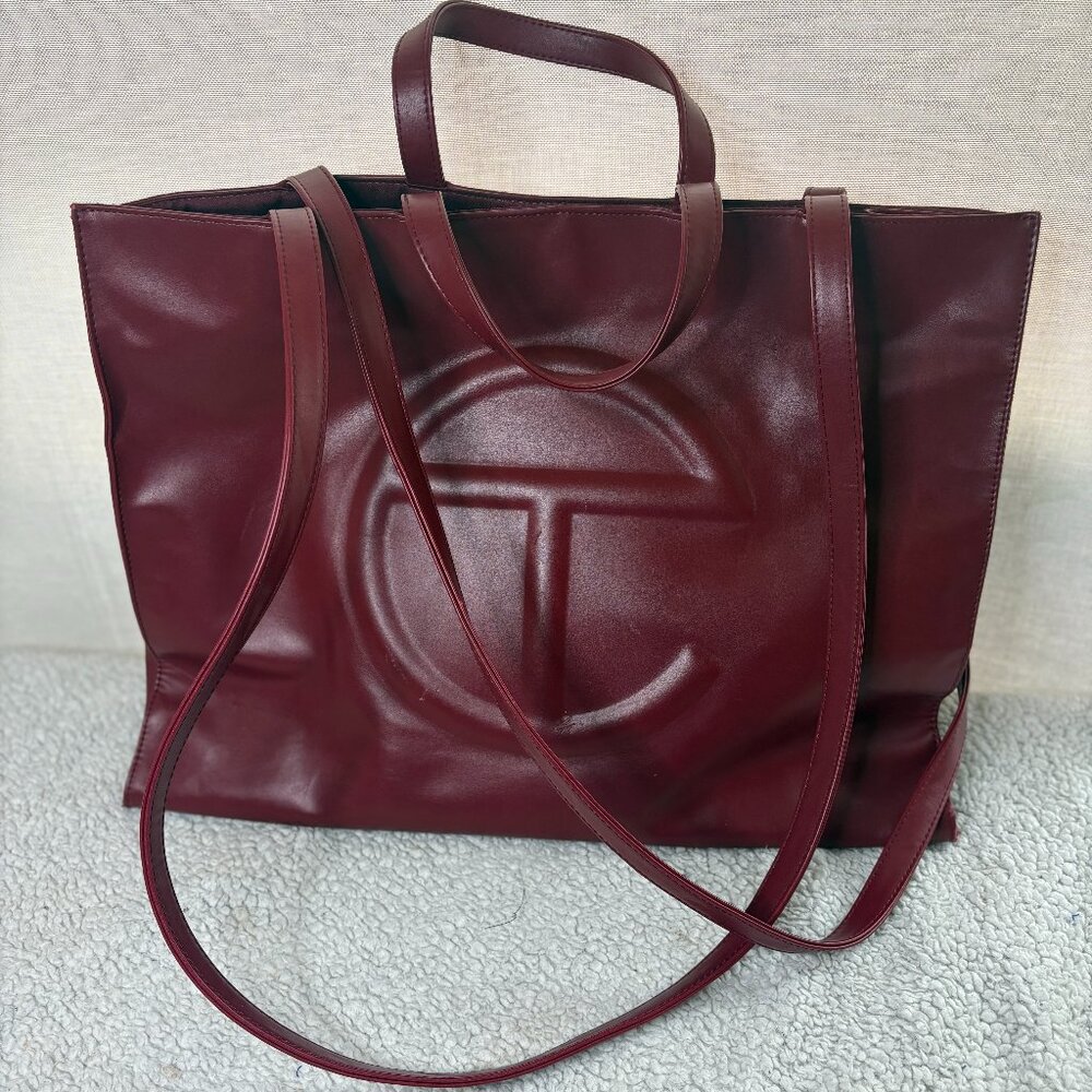Telfar large shopping bag in oxblood.